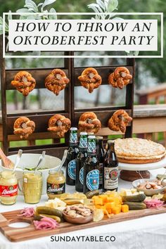 an outdoor oktoberfest party with beer, pretzels and other appetizers