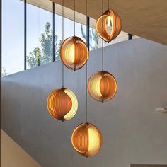 three circular lights hanging from the ceiling