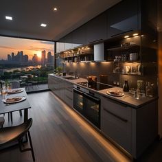 a kitchen with an oven, sink and dining table in front of a large window