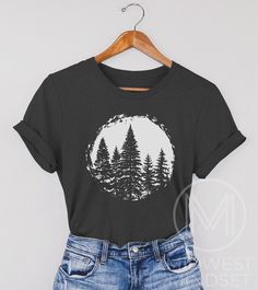 Pine Tree TShirt, Nature Lover, Forest Tee, Womens Camping, Hiking Gift, Tree Lover, Adventure TShirt, Camp Fire, Outdoors T-Shirt, Bellas Canvas 3001T: T-Shirt Sizing Please reference the size chart before selecting shirt size. Use one of your own t-shirts to measure the size and fit. Then compare with the size chart provided to ensure an accurate fit. T-Shirt Materials 100% combed and ring-spun cotton. Heather colors are 90% combed and ring-spun cotton, 10% polyester. Pre-shrunk fabric. Should Nature T-shirt, Nature Tshirt Design, Camping T Shirts Ideas, Nature Outfits Forests, Cricket Shirt Ideas, Tree Tshirt Design, Cool Shirt Designs Graphic Tees, Tshirts For Women Graphic Tees, T-shirt Designs