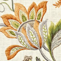 an embroidered fabric with flowers and leaves on it