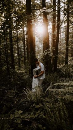 An evening engagement in the forest at sunset at Mud Bay Park.  Scheduling your engagement session in the evening means you get beautiful sunset glow.  Vancouver is the best city to schedule your engagement. Forest Proposal Photos, Redwood Forest Engagement Photos, Engagement Forest Photoshoot, Forest Couple Photoshoot Moody, Whimsical Forest Engagement Photos, Swamp Engagement Photos, Forest Preserve Engagement Photos, Engagement Photos Forest Woodsy, Dark Forest Engagement Photos