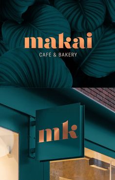 an advertisement for a cafe and bakery called makai on the front of a building