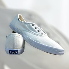 Slip into comfort and classic style with these Keds Champion White Canvas Sneakers! Featuring a timeless low-top design, these sneakers are perfect for everyday wear. Well-loved and used, they show signs of wear but still have plenty of life left. Great for casual outings, these versatile sneakers can pair effortlessly with any outfit. Features: - Authentic Keds Champion Sneakers - Classic white canvas with a low-top design - Size 39 EU (US Women's 8, UK Women's 5.5) - Used condition with visibl White Canvas Sneakers, Versatile Sneakers, Champion Sneakers, Keds Sneakers, Keds Champion, Sneakers Athletic, Top Design, Canvas Sneakers, White Canvas