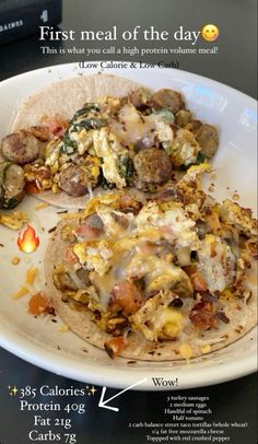 a plate with some food on it and an advertisement for the first meal of the day