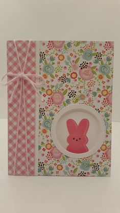 a small card with a pink bunny on it