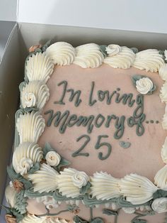 a cake in a box that says i'm loving memory 25