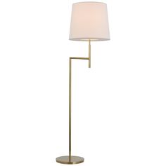 a floor lamp with a white shade on the base and a gold metal frame around it