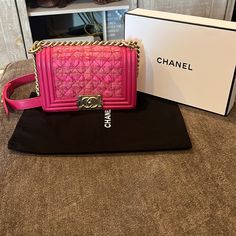 Authentic Chanel Tweed Boy With Dust Bag And Box And Entrupy Certificate. 2017 Production This Chanel Boy Flap Bag Quilted Ribbon And Tweed With Leather Old Medium, Features Chunky Chain-Link Strap And Aged Gold-Tone Hardware. Its Boy Push-Lock Closure Opens To A Pink Fabric Interior With Slip Pocket. Hologram Sticker Intact. In Very Good Condition With Minimal Rubs And Or Scratches On Leather, Hardware And Tweed Showing Little Fraying. This Is An Absolute Beauty. Add Her To Your Collection. You Won’t Be Disappointed. Steal Her Now. As We All Know With Chanel, She Keeps Going Up In Price. Measurements: Handle Drop 11", Height 6", Width 10", Depth 3", Strap Drop 20" Its Boy, Chanel Tweed, Hologram Stickers, Pink Tweed, Pink Chanel, Leather Hardware, Chanel Boy, Pink Fabric, Chanel Boy Bag