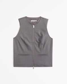 Elevate your wardrobe with the A&F Mara Zip-Up Vest, a perfect blend of style and comfort. This vest is designed for the modern woman, featuring a chic dark gray color that complements any outfit.

- Size: XS
- Color: Dark Gray
- Material: Polyester, Viscose, Elastane
- Gender: Female
- Features: Zip-up front, on-trend seaming details, front pockets

Crafted from a soft synthetic blend, this vest offers both warmth and flexibility, making it ideal for layering over your favorite shirts and blous Female Features, Pocket Craft, Grey Vest, Dark Grey Color, Synthetic Fabric, Favorite Shirts, Easy Wear, Womens Vest, Zip Up