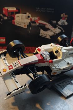 a lego race car sitting on top of a table