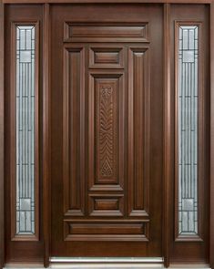 a wooden door with glass panels on the sides and sidelights in dark brown wood