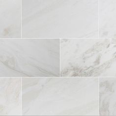 white marble tiles with different patterns and colors