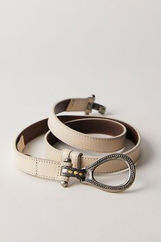 The perfect piece to pair with absolutely every outfit, this wear-anywhere belt is featured in a luxe leather fabrication with western-inspired buckle for an added timeless touch. **Features:** Fixed length, hook closure, contrast stitching, leather fabrication **Why We ❤ It:** Add effortless edge to every look with this versatile, vintage-inspired belt. | Casanova Leather Belt by Free People in Tan, Size: M/L Chic Leather Belt Buckle With Antique Detail, Chic Leather Belt Buckle With Antique Design, Chic Leather Belt Buckles With Antique Buckle, Western Belts With Belt Loops For Everyday Use, Leather Belts With Antique Buckle For Rodeo, Western Leather Belts, Western Leather, Stitching Leather, Leather Belts