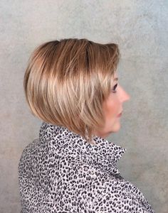 Katie Wig by Henry Margu | Mono Part Katie is a chic, stacked cut with a feathered neckline and soft bangs. A monofilament part and lace front create a seamless hairline for added styling versatility. Color Shown: 25GR Fiber: Synthetic Cap: Average Bang: 4¼” Ear tab: 5½” Nape: 1¾” Top: 3 - 6½” Sides: 4 - 6½” Back: 6½ Weight: 2.70 oz Light Brown Middle Part Wig, Mid Length Blonde Wigs, Ash Blonde Human Hair Wigs With Bangs, Synthetic Hair Care, Henry Margu Wigs, Soft Bangs, Dark Strawberry Blonde, Light Strawberry Blonde, Gold Blonde Highlights