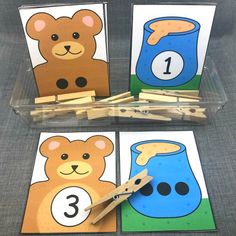 four cards with numbers and teddy bears on them