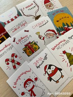 six christmas cards with santa claus, penguin, snowman and other holiday greetings