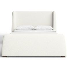 a bed with white linens and pillows on it's headboard, against a white background