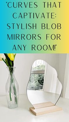 a vase with yellow flowers sitting on top of a white table next to a mirror