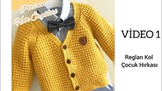 a yellow cardigan sweater with a bow tie