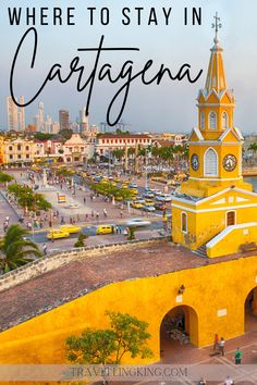 a yellow clock tower with the words where to stay in cartagena on it