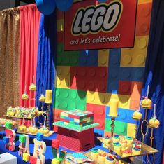 a lego themed birthday party with cake and cupcakes