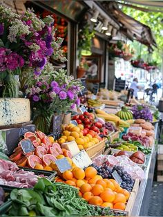 an outdoor market with fresh fruits and vegetables