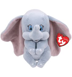 an elephant stuffed animal with a heart tag