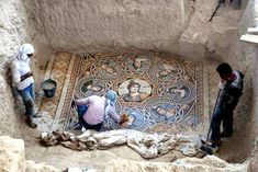 some people are working on a mosaic in an old stone building with the caption'this stunning ancient greek floor mosaic was just carved in southern turkey, near the syrian border