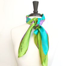 "Size: 30\" x 30\" Colors: Pierre Cardin JEUNESSE vibrant graphic daisy silk scarf, olive green, pink, lime and aqua Material: silk twill Condition: Excellent Hem: hand-rolled Make: Pierre Cardin Made in France Pierre Cardin Signature in the corner. Part of the Jeuness youth line. See all our Pierre Cardin scarves: https://etsy.me/2YKJUk4 All scarves in this shop are hand-washed in organic biodegradable soap with organic lemon oil and sometimes vinegar in cold water and pressed on a cool iron se Green Chic Silk Scarves, Chic Green Silk Scarves, Chic Green Silk Scarf Gift, Chic Green Silk Scarf For Gift, Chic Green Silk Scarf For Spring, Green Scarf As Spring Gift, Green Scarf For Spring Gift, Chic Green Scarf For Gift, Green Scarves For Spring Gift