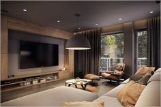 a living room filled with furniture and a large flat screen tv mounted to the wall