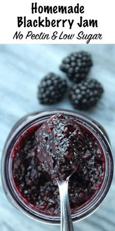 homemade blackberry jam in a jar with spoon