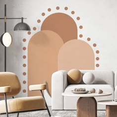 a living room filled with furniture next to a wall painted in pink and orange colors