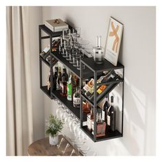 a shelf filled with wine glasses and bottles