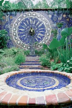 Mediterranean garden with vibrant mosaic tiles adding color and charm. Tuscan Landscaping Ideas, Tuscan Landscaping, Mediterranean Landscaping, Garden Design Layout