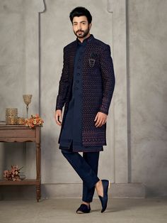 Blue  Colour Handcrafted front open Designer Indowestern for men with elegant kurta inside made from the finest silk fabric will make you feel like a king on the happiest & most important day of your life.you can customize it according to your measurement as the fitting make it more beautiful to wear.Its beautifully hand embroidered and zari work all over and on sherwani shwal.Elegant sherwani for groom,groom sherwani,sherwani for men sherwani men,indowestern for men,Indowestern For Men, COST INCLUDED SHERWANI ,TROUSER & KURTA AS IN THE PICTURE Bollywood Style Sherwani For Wedding In Winter, Bollywood Style Sherwani For Winter Weddings, Bollywood Style Wedding Sherwani For Winter, Winter Wedding Sherwani With Resham Embroidery, Reception Dress Groom, Engagement Dress Groom, Groom Dress For Wedding, Indowestern Men, Men Sherwani Wedding Indian Groom