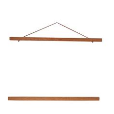 a wooden shelf hanging on a wall with two clothes pins attached to the hanger