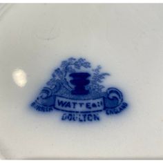 a blue and white porcelain bowl with the words wattteah pottery on it