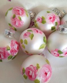 pink roses painted on white glass ornaments