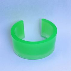 Height 3.5 cm- 3.2 cm opening. 6.3 cm approx inner diameter (at largest point) Fits most wrists.Glows green. Dark Earrings, Neon Bracelets, Rave Party, Punk Rave, Party Accessories, Star Earrings, Neon Green, Earring Gifts, In The Dark