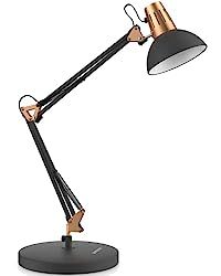 a black and gold desk lamp on a white background