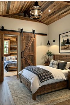 a bed room with a neatly made bed and wooden doors