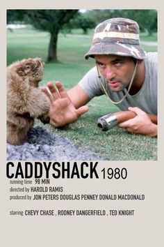 the poster for caddyshack is shown with a man and a small animal