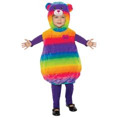 a child wearing a rainbow bear costume