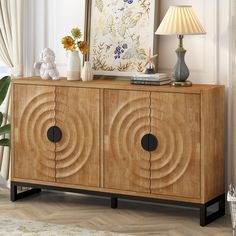 a wooden cabinet with two circles on the front and one circle on the back, in a living room