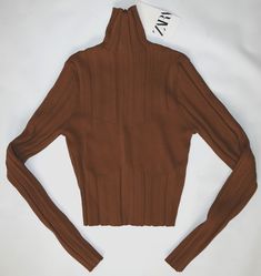 Trendy Stretch Sweater With Ribbed Neckline, Brown Stretch Turtleneck Sweater, Trendy Tops With Ribbed Collar For Fall, Trendy High Stretch Sweater For Fall, Trendy High Stretch Fall Sweater, Winter Ribbed Stretch Tops, Stretch Fine Knit Brown Sweater, Stretch Brown Fine Knit Sweater, Brown Long Sleeve Top With Ribbed Collar