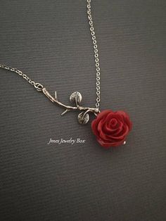 Silver branch necklace with red rose, Rose branch necklace, Red rose necklace, Beauty and the beast necklace, Tiny silver branch necklace by jmesjewelrybox on Etsy https://www.etsy.com/listing/563432121/silver-branch-necklace-with-red-rose Red Jewelry Necklace, Beauty And The Beast Necklace, Toko Fukawa, Rose Branch, Fantasy Things, Beauty Movie, Jewelry Wishlist, Silver Rose Ring, Resin Rose