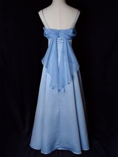 Step into timeless elegance with this Vintage Blue Satin Gown. Crafted from luxurious satin, this dress features delicate spaghetti straps that provide a graceful and feminine silhouette. The highlight of this gown is its unique winged back design, adding a touch of whimsy and sophistication. Perfect for formal occasions, evening events, or any special celebration, this elegant dress ensures you'll make a stunning entrance. The vintage blue hue adds a classic touch, making it a versatile additio Hot Prom Dress, Long Party Dress, Black Prom Dresses, Glam Dresses, Prom Dresses Blue, Party Dress Long