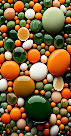 an abstract painting with oranges, green and white rocks in the shape of circles