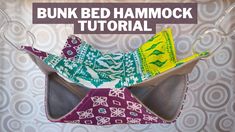 an origami bed hammock is made from fabric and has the words bunk bed hammock on it